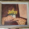 Paul Maze (1887-1979) A Still Life of Primroses in a Jug on a Patterned Cloth.